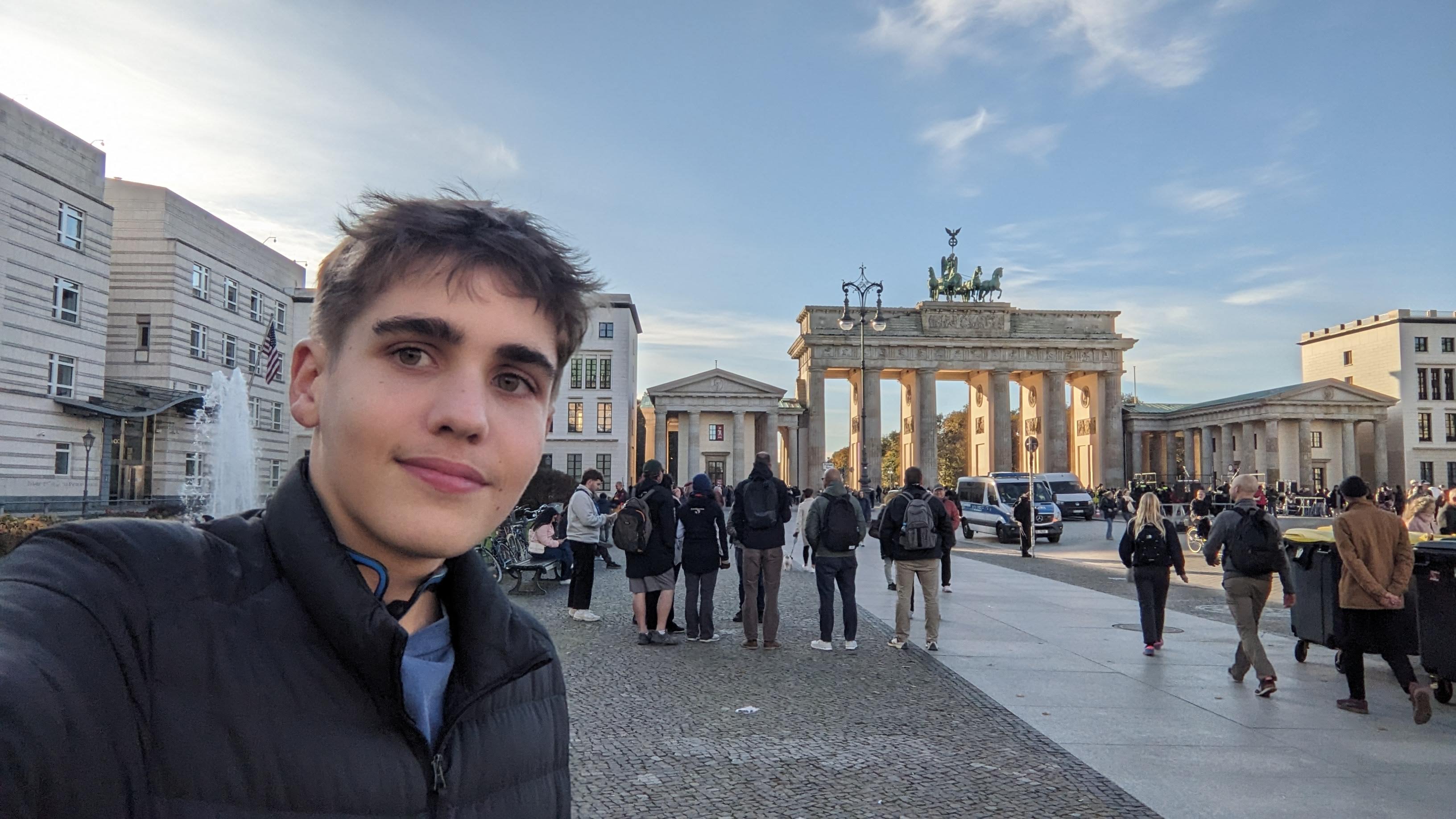 Tom in front of the Brandenburg Gate in Berlin