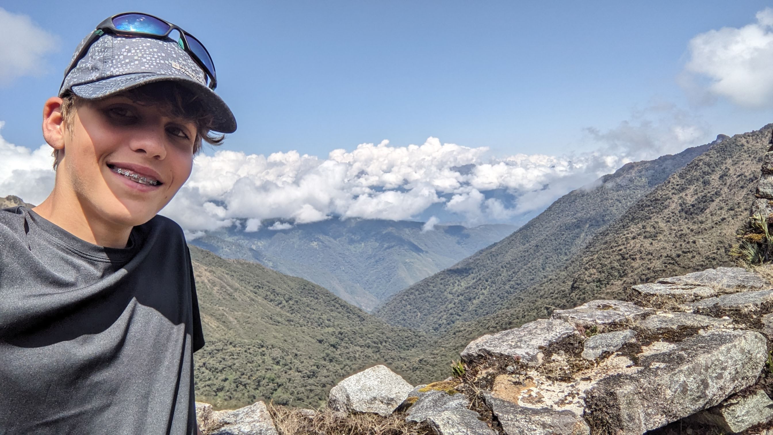 Tom beside a V-shaped valley on the Machu Picchu trail